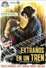 Extra�os en un tren